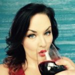Sarah Murrell drinking wine