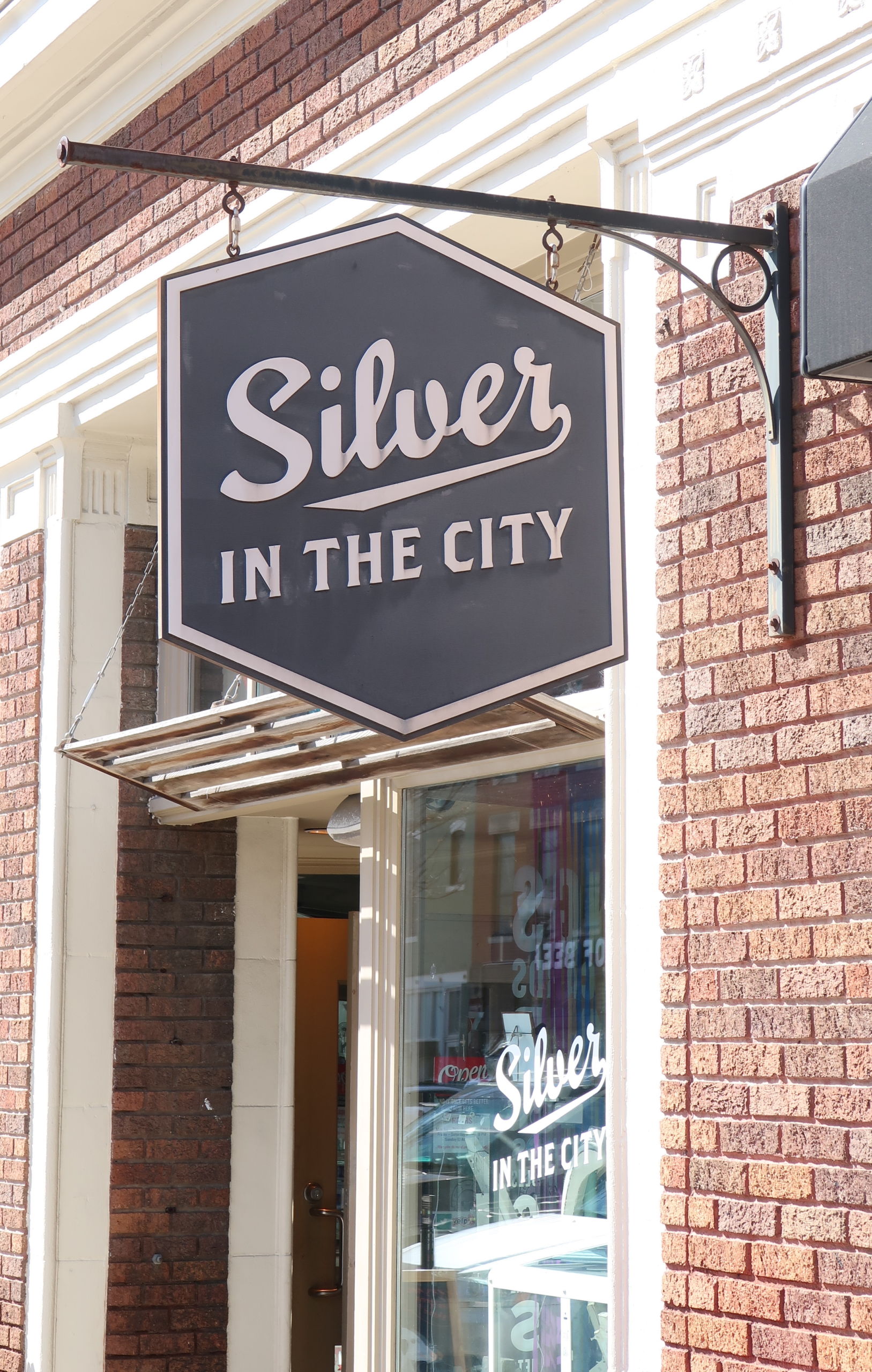 Silver in the City storefront and sign