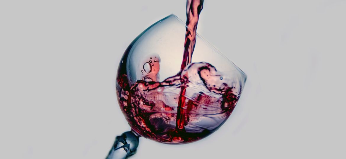 glass of wine being poured