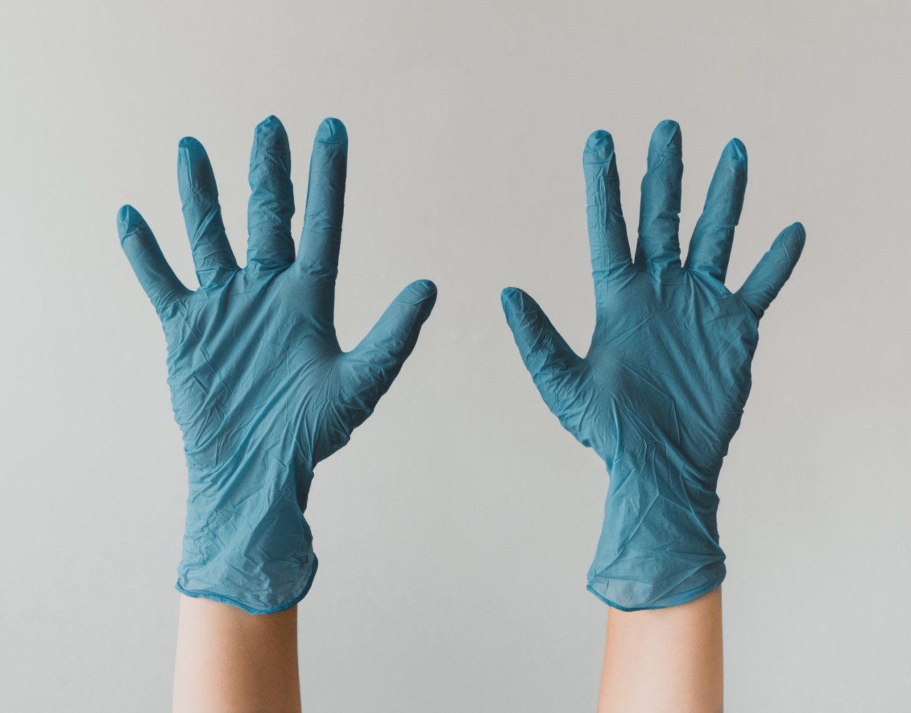 hands in gloves