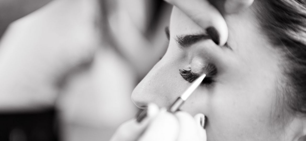 Makeup artist applying eyeshadow
