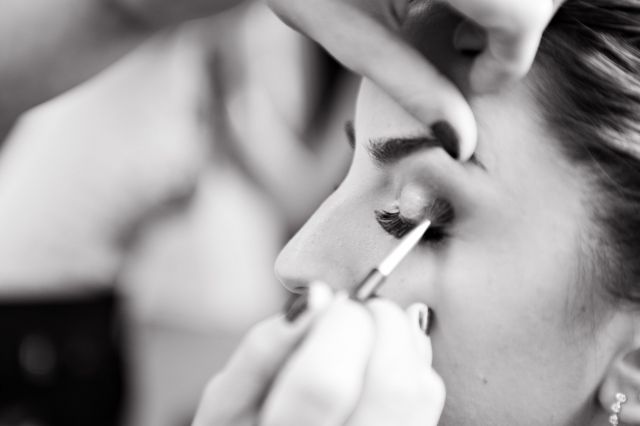 Makeup artist applying eyeshadow