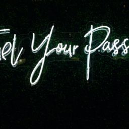 A neon sign reads "Fuel your Passion."