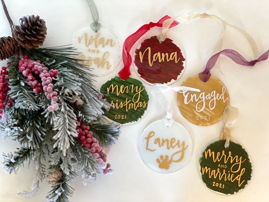 Jackie Renick's personalized ornaments, which feature Christmas colors and cursive