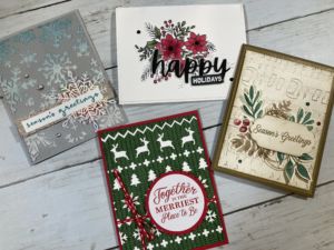 A selection of holiday cards from a Hand Stamped by Cheryl card making class