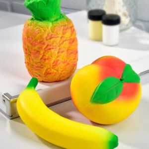 Three squishy fruit toys from Nurture Boutique in downtown Indianapolis