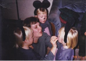 A photo of Cindy Kupiainen and triplets
