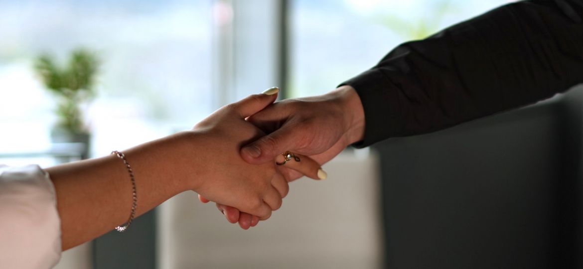 Women shaking hands