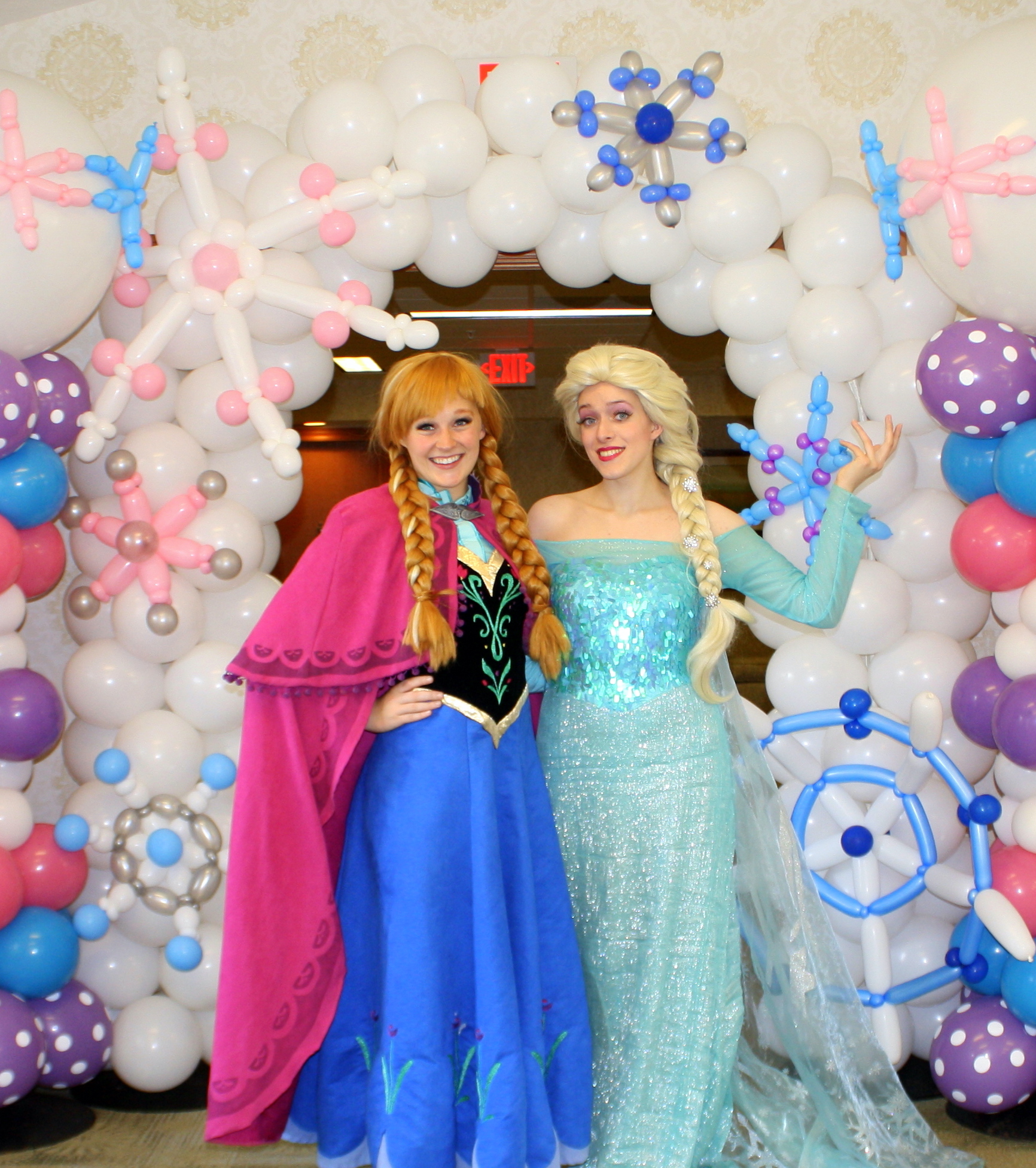 A photo of Elsa and Anna from Happily Ever After Productions