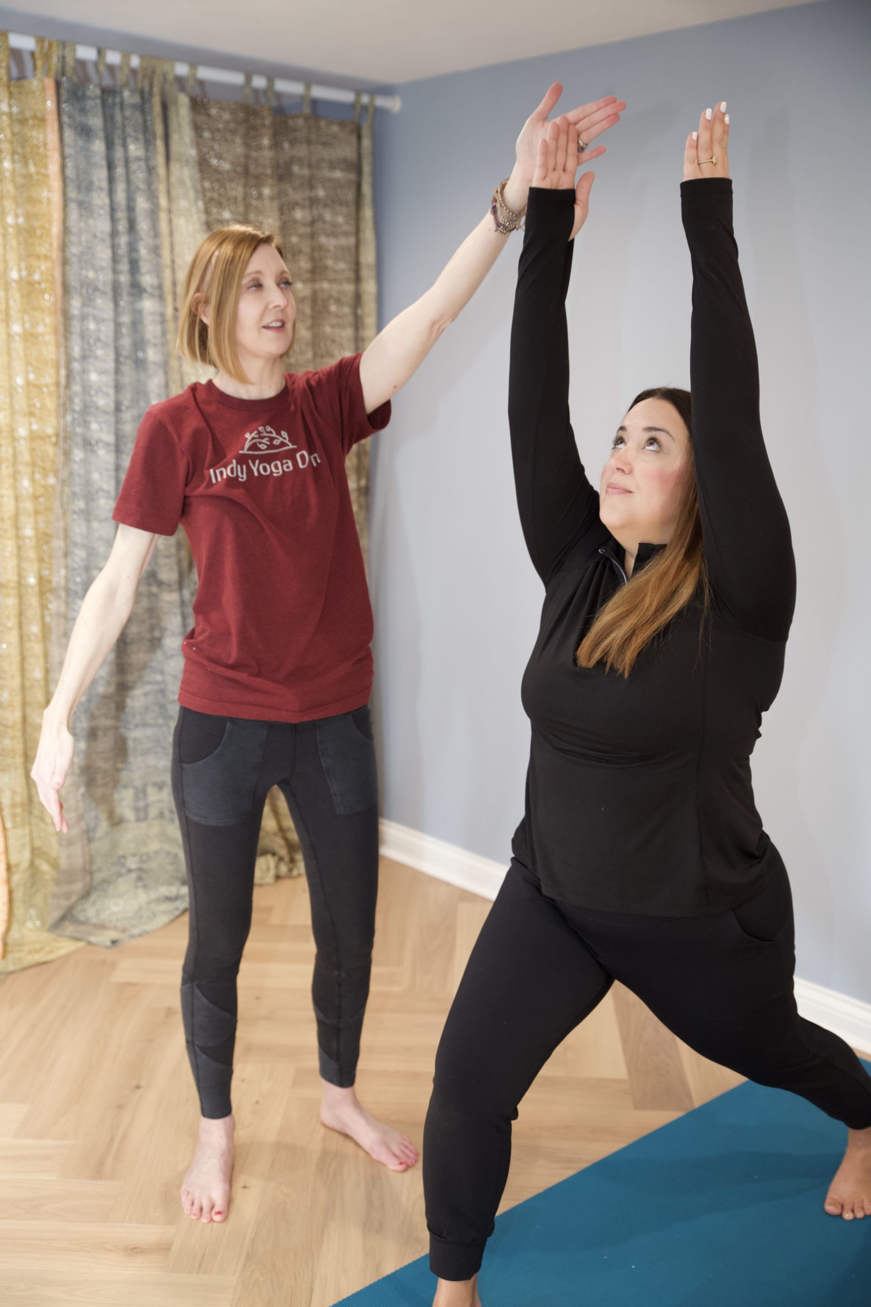 Jenny Siminski teaching a private yoga class