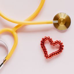 A photo of a stethoscope and a heart