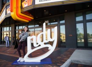 A photo of Julia Ricci by the Indy Sign