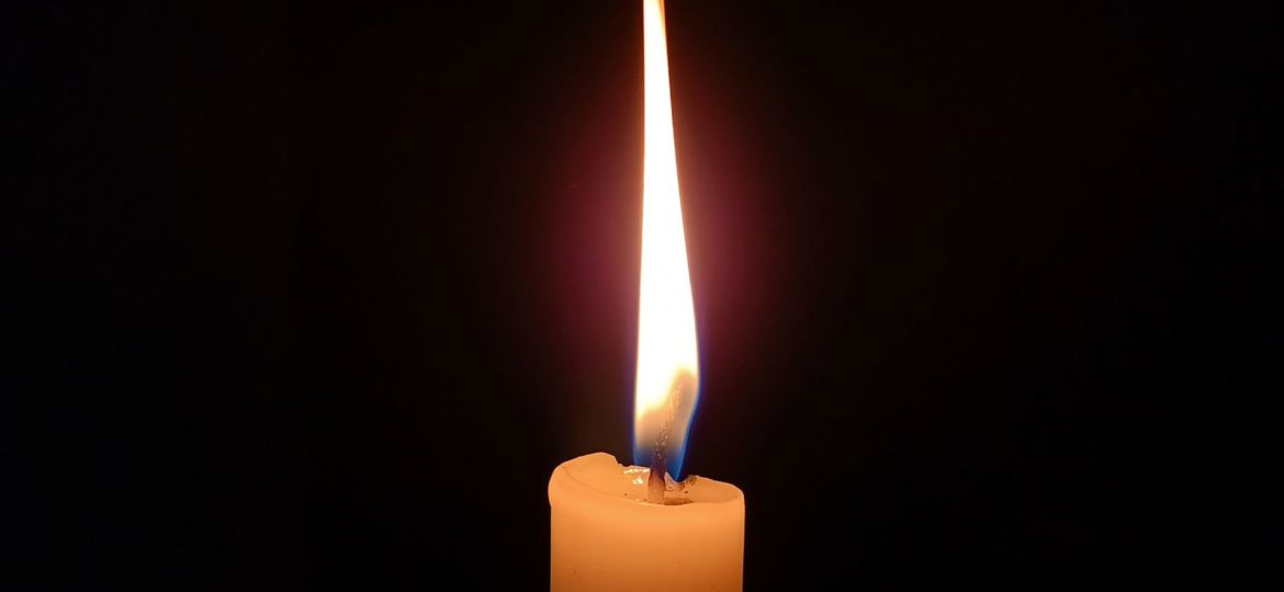 A photo of a lit candle