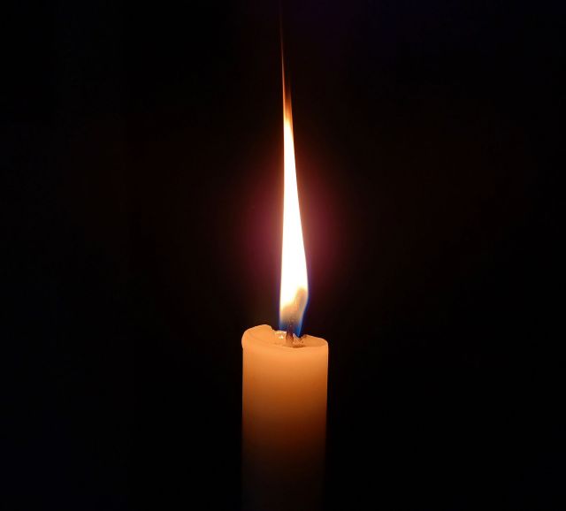 A photo of a lit candle