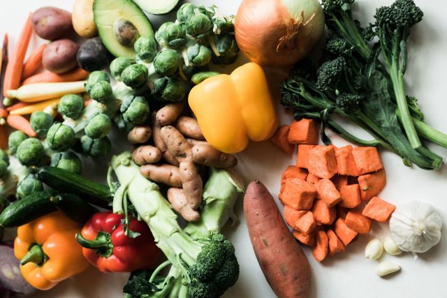 A photo of multiple different vegetables and healthy food