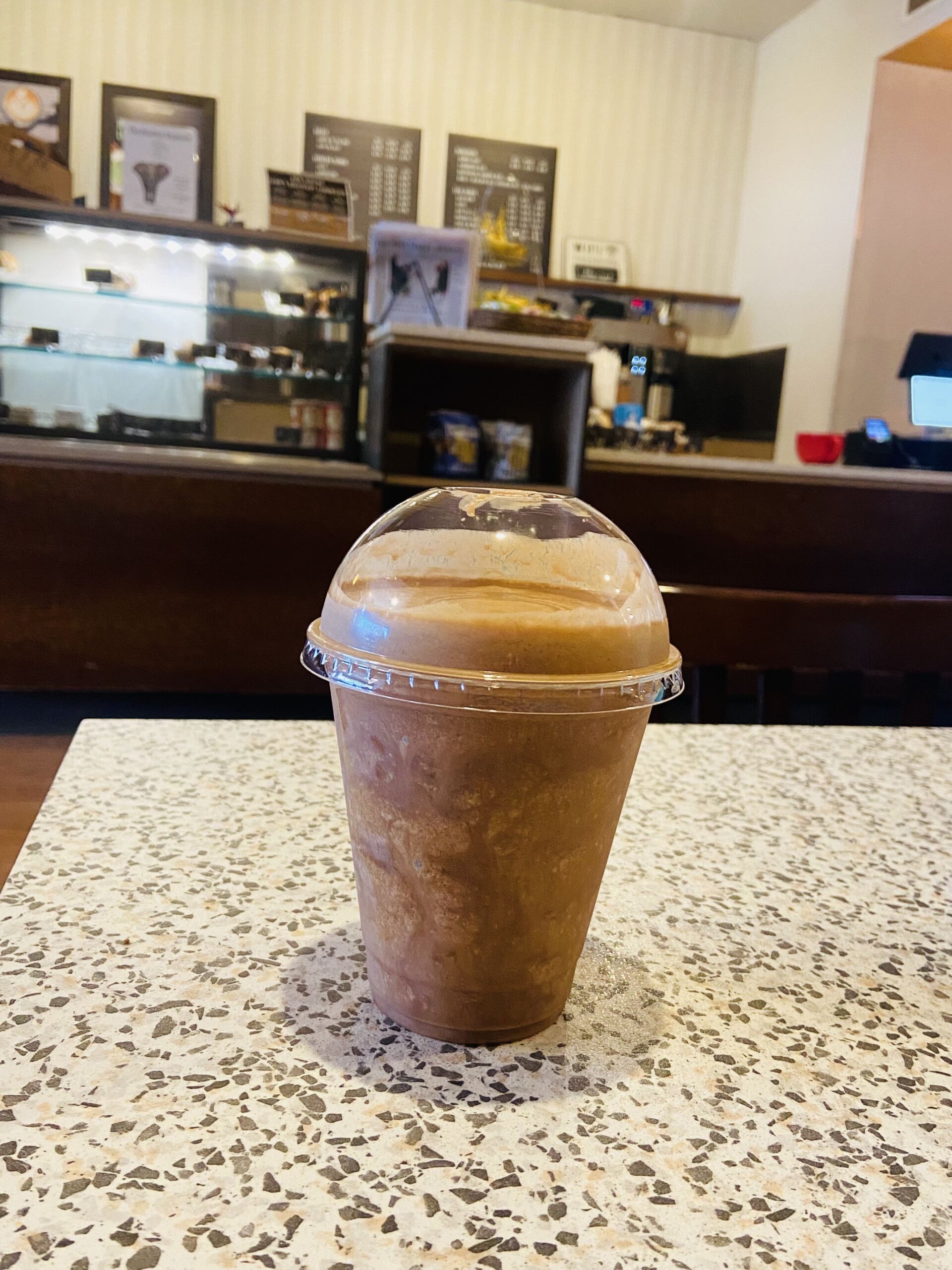 Hubbard & Craven Healthy Elephant smoothie with cafe in the background