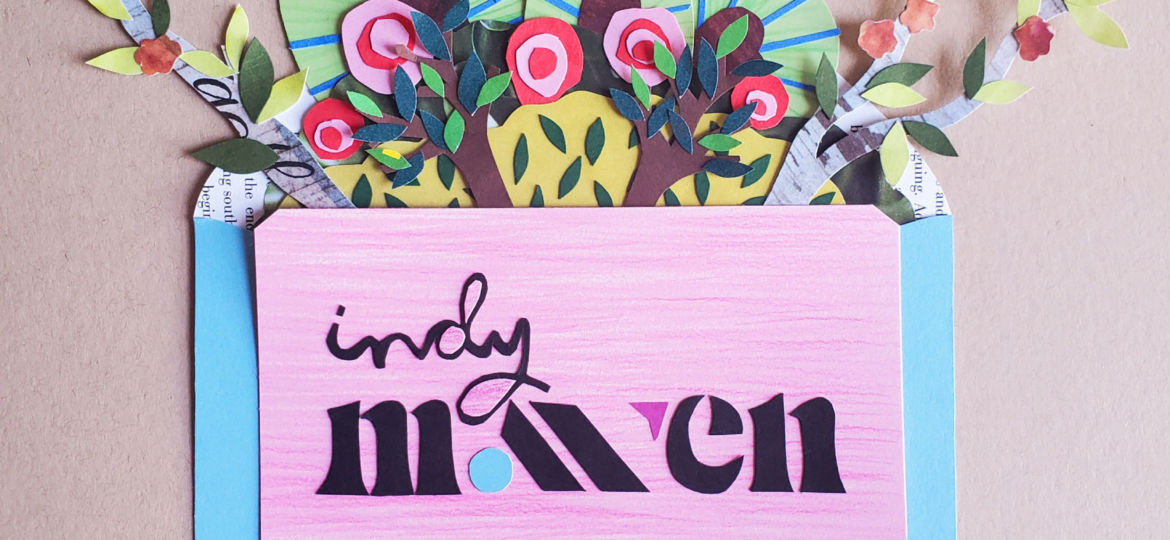 A paper collage of the Indy Maven logo