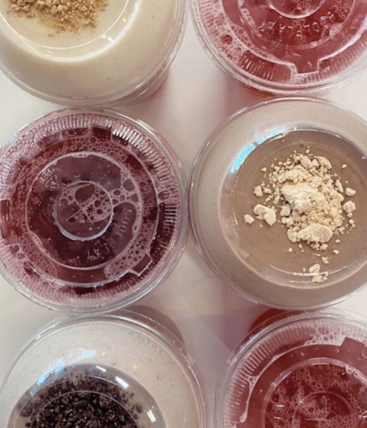 A photo of the top of multiple protein smoothies