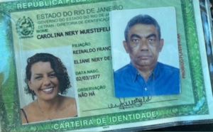 A photo of an ID with a picture of a man and a woman