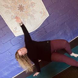 A photo of a woman doing a yoga pose