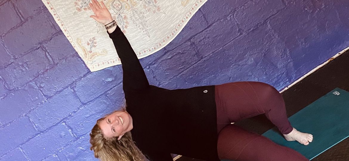 A photo of a woman doing a yoga pose
