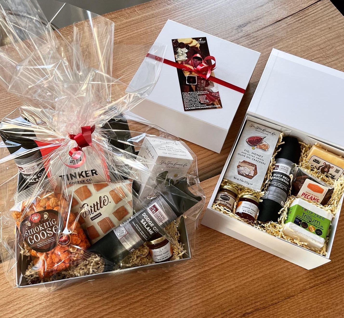 A photo of a gift basket that has different foods and spices