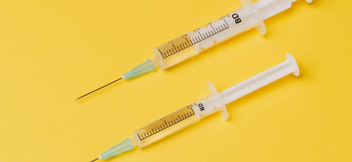 A photo of two syringes for the HPV vaccination story