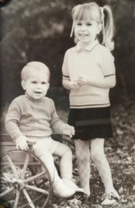A black and white photo of two children
