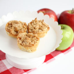 A photo of three mini apple pies