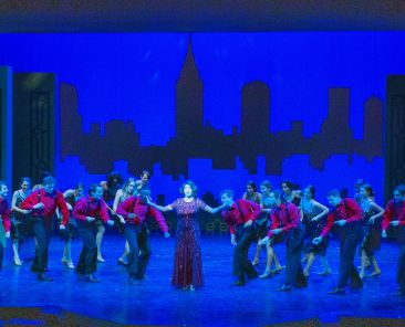 A photo of people rehearsing for a Summer Stock Stage production