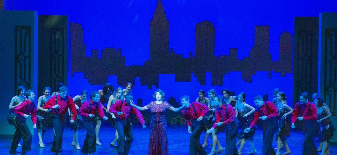 A photo of people rehearsing for a Summer Stock Stage production