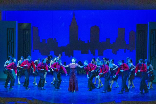 A photo of people rehearsing for a Summer Stock Stage production