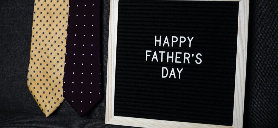 Neckties next to a Happy Father's Day sign