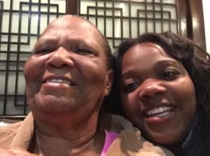 a photo of Keia Walker and Big Ma smiling and taking a selfie