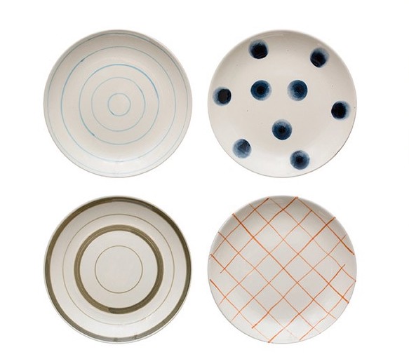 Four plates in different patterns
