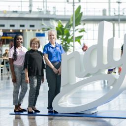 Three women at the Indianapolis International Airport