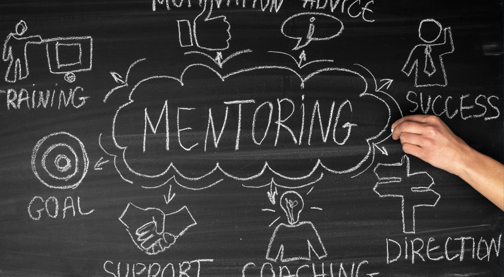 Chalkboard with "Mentoring" written on it