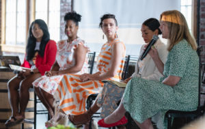 5 women sitting who are panelists for the Women Equity Brunch June 2022