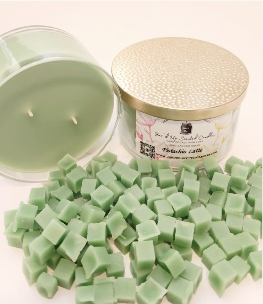 Jar'd Up Scented Candle in Pistachio, with wax melts, all green. Coconut milk and peach skin are enhanced by mid notes of pistachio, coffee, and caramel syrup with base notes of whipped sweet cream and sugar crystals.