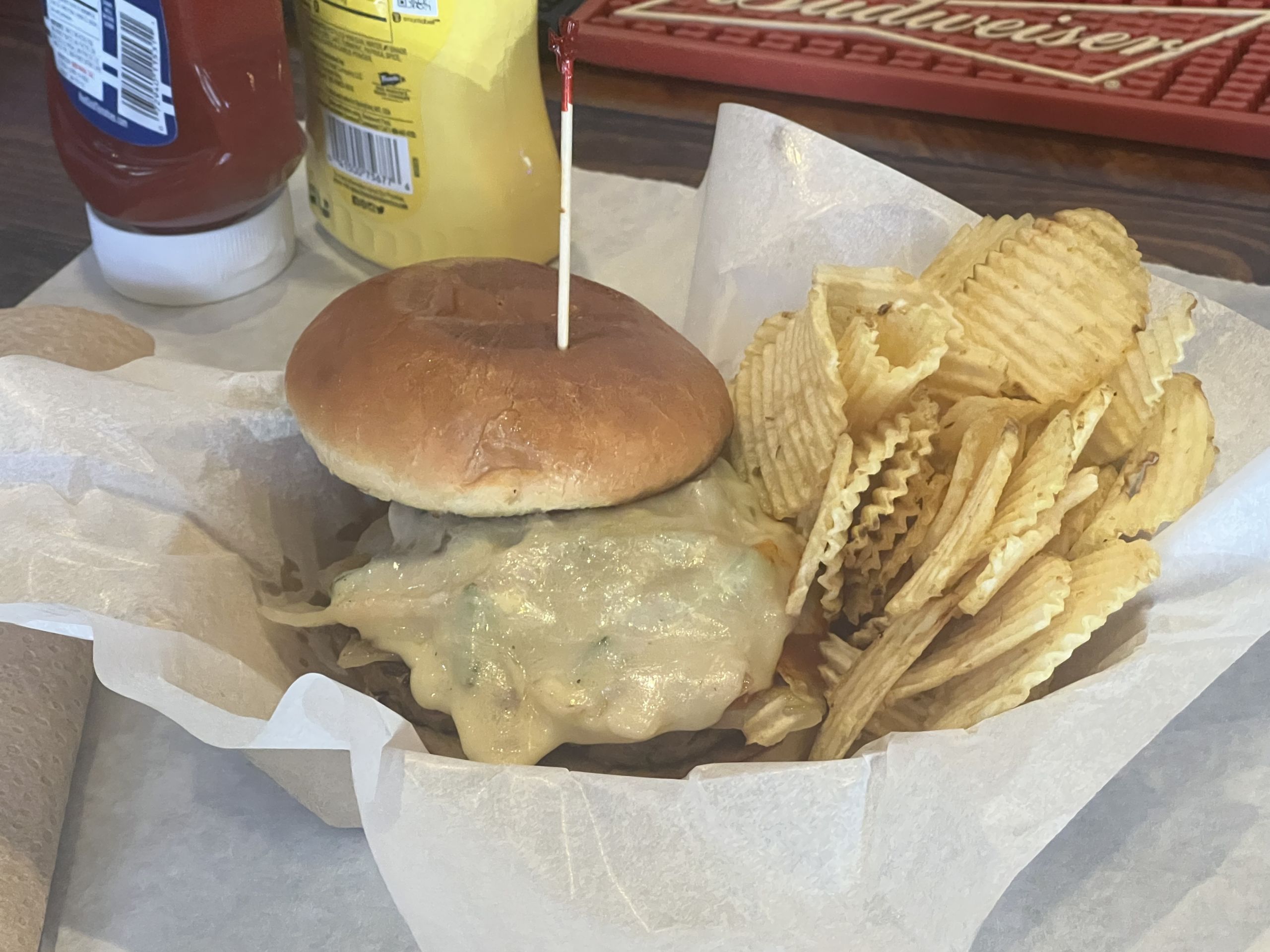 Ghost Burger served in a tray with potato chips