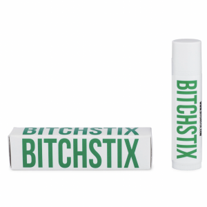 Box that says "BITCHSTIX" in green lettering on its side with tube upright