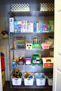 organized closet in mudroom/playroom