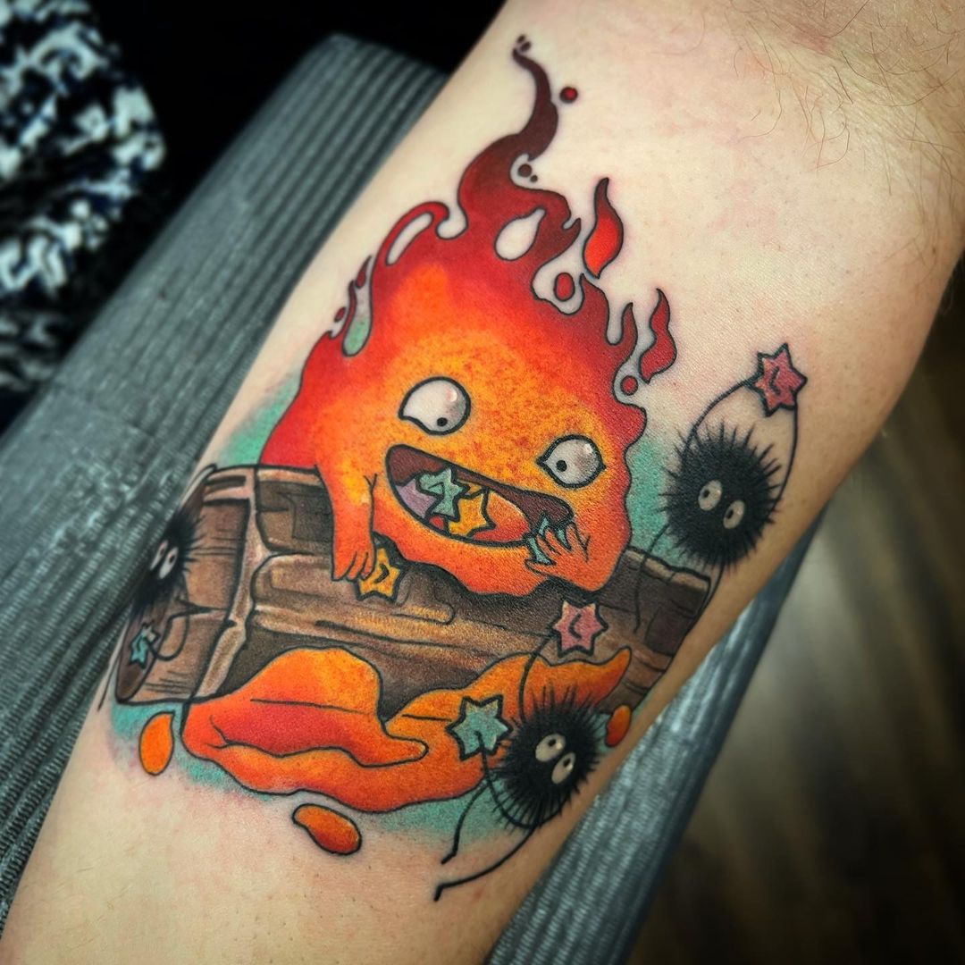 Arm tattoo of cartoon flame