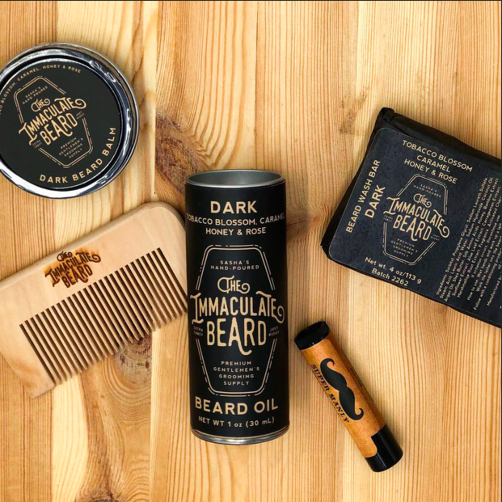 Assorted Beard Grooming items, including a comb and oil