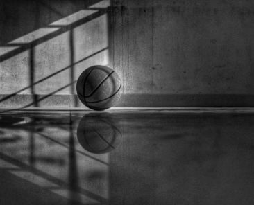 a black and white picture of a basketball