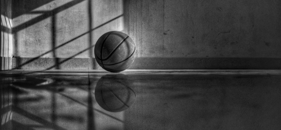 a black and white picture of a basketball
