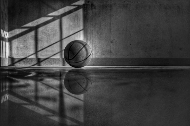 a black and white picture of a basketball