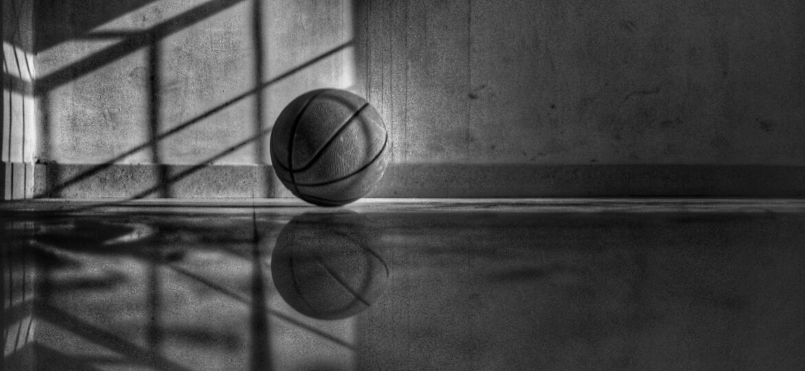 a black and white picture of a basketball