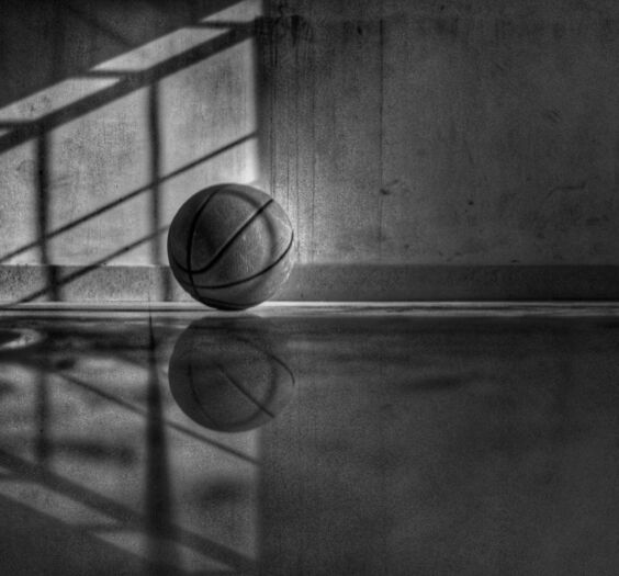 a black and white picture of a basketball