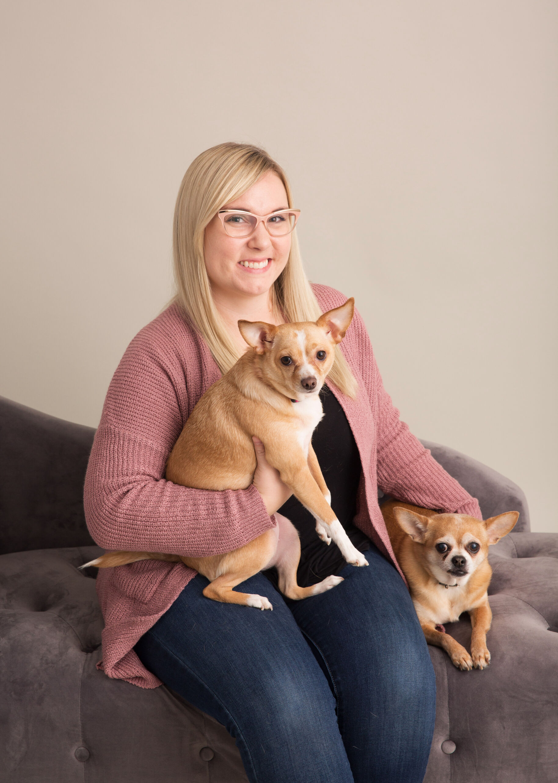 Marissa of Furtography Studio holding two dogs